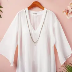 Bluzka z rozciętymi rękawami: 9 najlepszych sposobów na modny look
